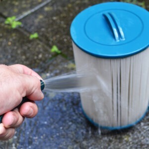 A person spraying out a filter