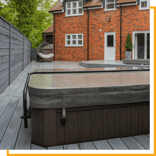 covered hot tub in backyard