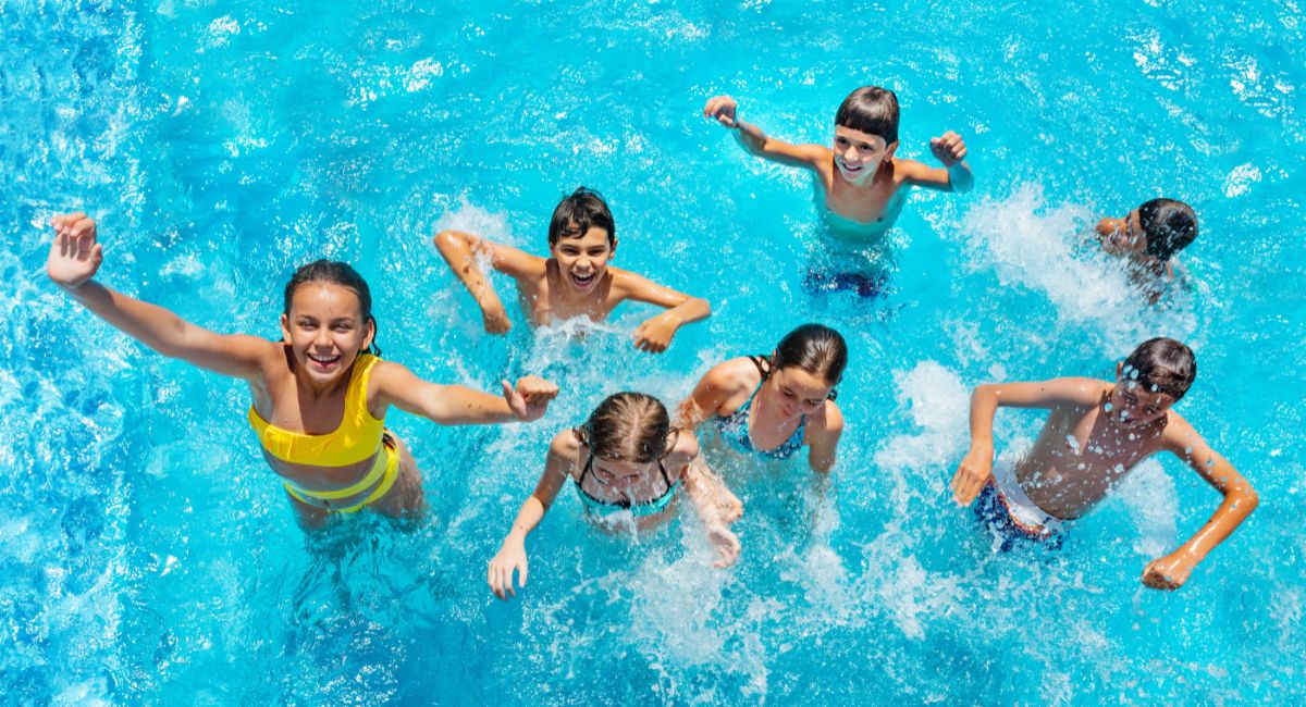 kids enjoying backyard pool