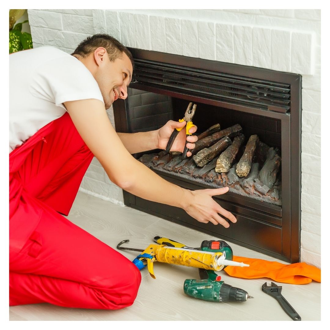 technician installing fireplace