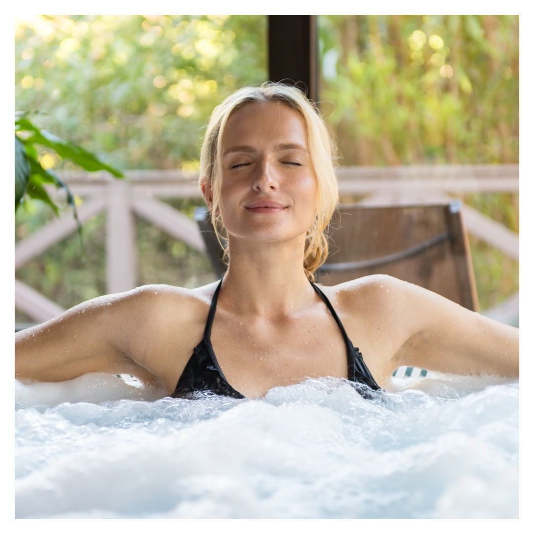 woman relaxing in hot tub