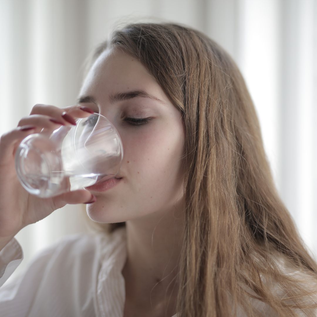 A woman drinking water