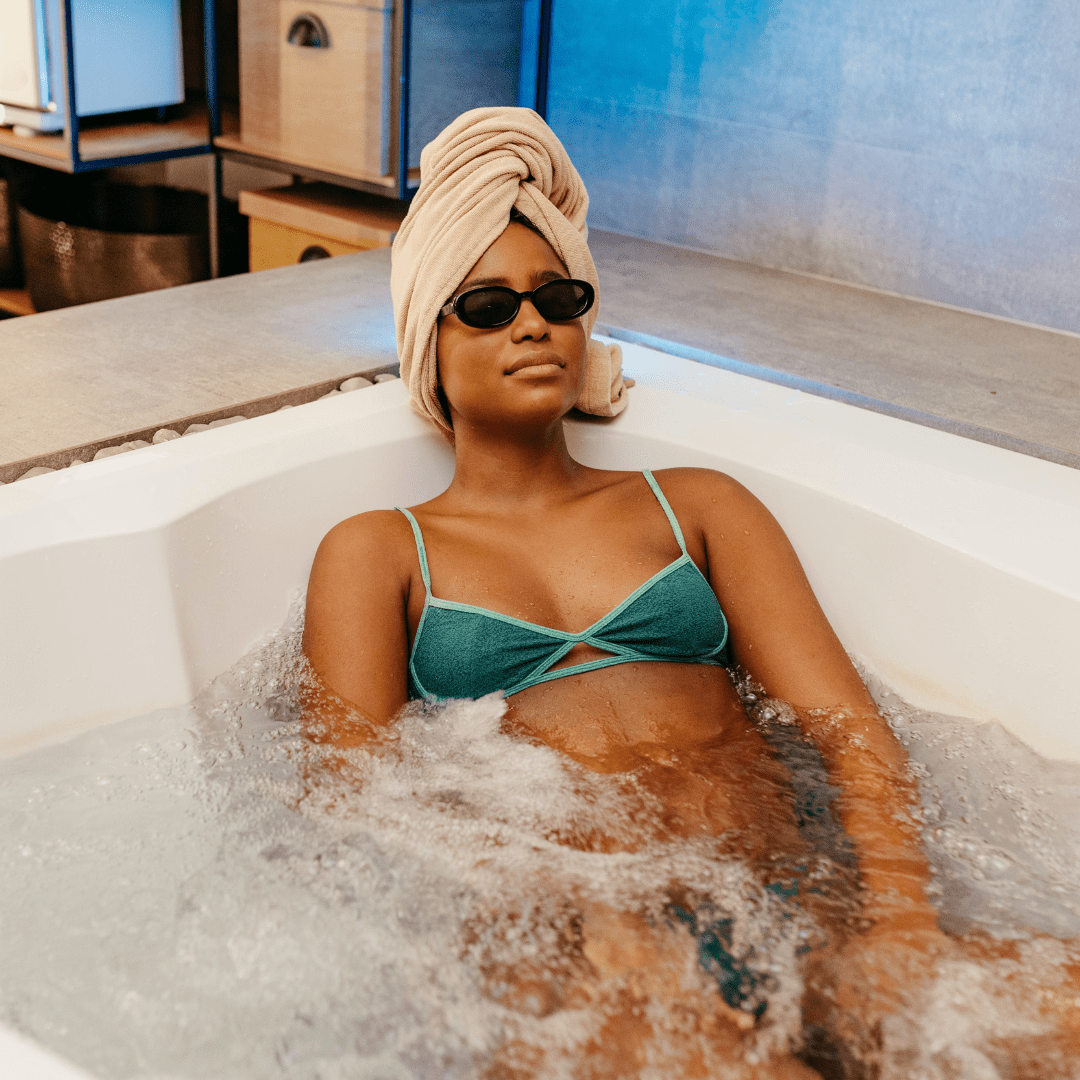 A women relaxing in a tub