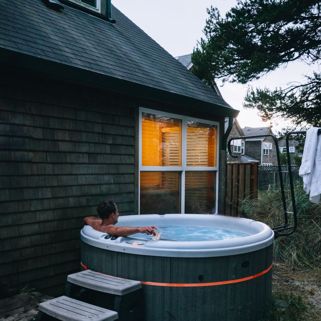 A man relaxing in a hot tub