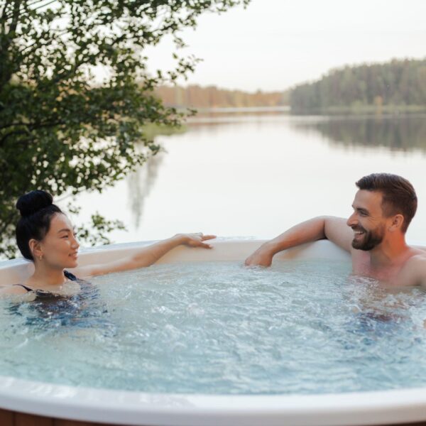 couple in swim spa