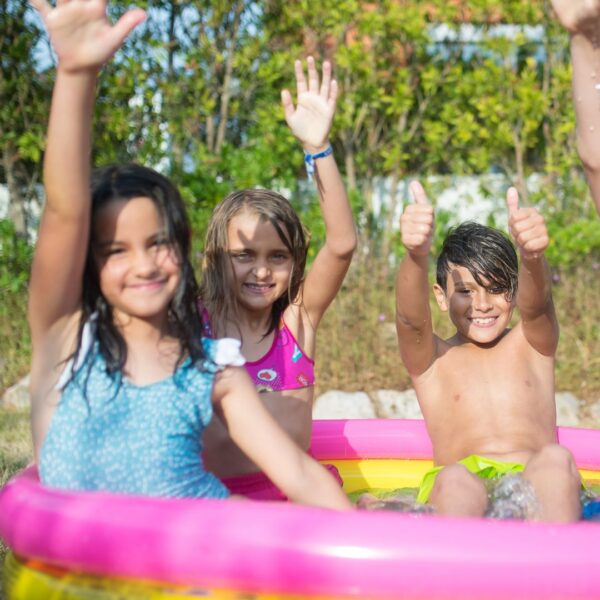 kids in inflatable pool