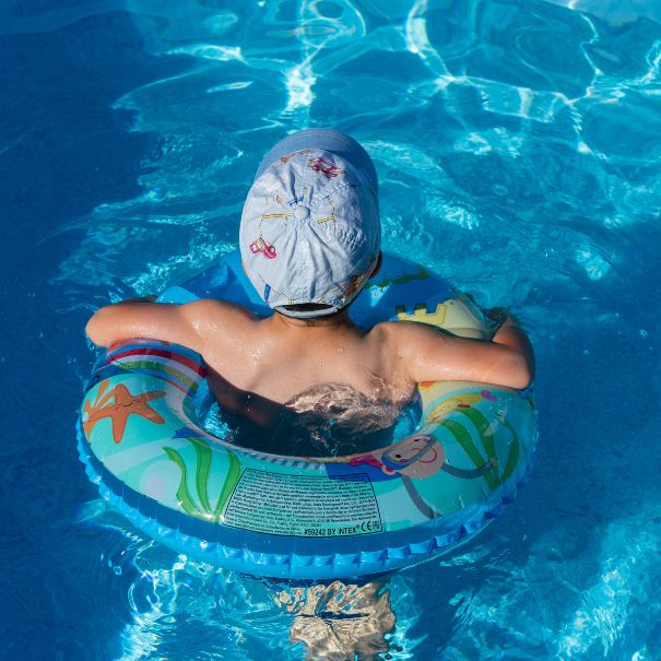 Small child in a pool float
