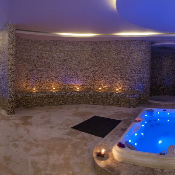 Well lit area by hot tub