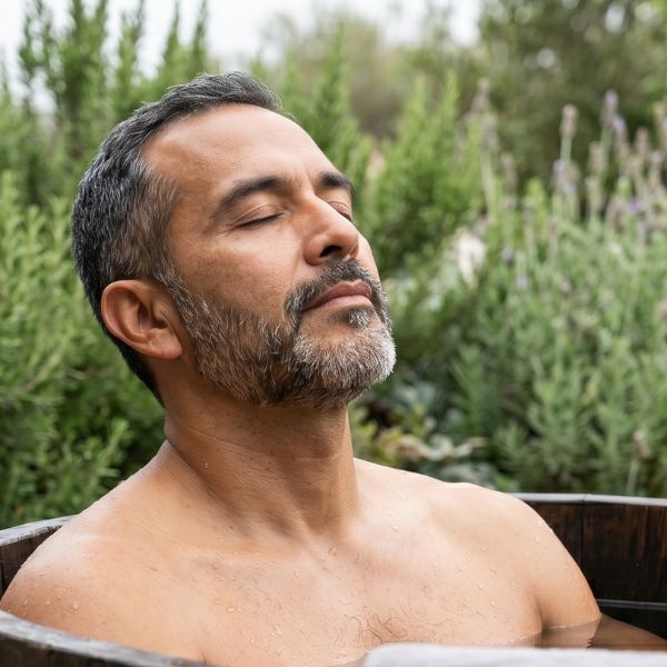 man in cold plunge tub