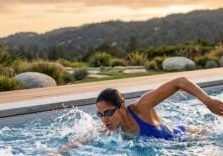 woman swimming in swim spa