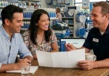 photo of pool salesman and couple